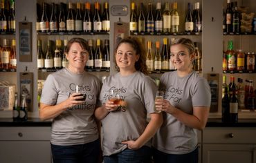 Portrait of staff at Vintage 414 Wine Bar, a small business in Cambridge, MD - photo by Jill Jasuta