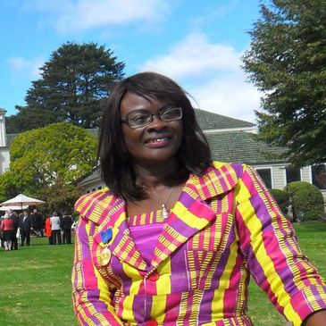 a woman standing near a stand