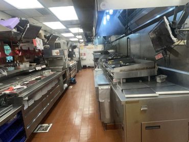Restaurant hood and kitchen area after CleanHoods TX serviced the location