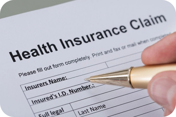 Health insurance claim form showing sections for personal and medical details.