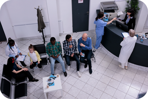 Patients sit in a waiting room, showing various expressions while waiting for appointments.
