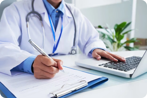 Doctor writes notes emphasizing the role of specialized healthcare departments.