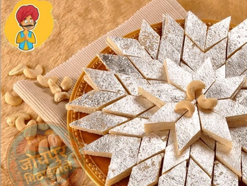 Traditional Indian mithai garnished with cashew nuts.