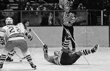 A stick in the skate is a good way to slow down Bobby Hull.