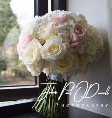 White hydrangea and rose wedding bouquet