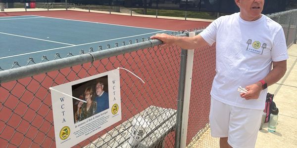 Past WCTA prez Bob Neil hanging our Plaque honoring our WCTA founder, Bob (Diane) Kerrigan