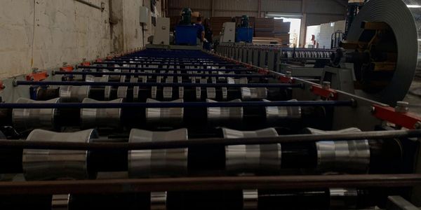 Roof sheet operating machine