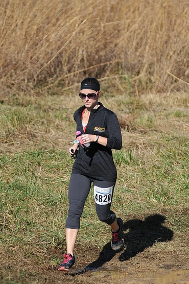 Club founder running trail race