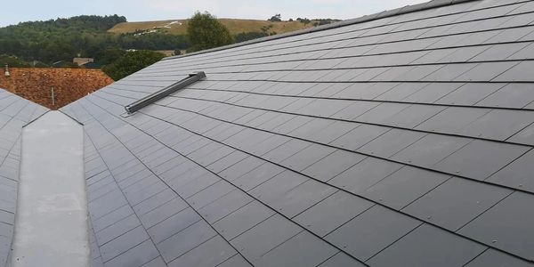 Slate roof with a grp gully on a barn