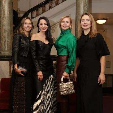 Social Elegance members, four women dressed in elegant clothes