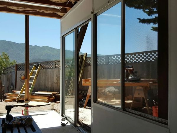 Construction/remodeling site of outside window, balcony, studs.