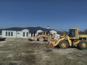 Residential, site pads, roads, Ironwolf, TexHall Rock Milling, ranch, subdivision, municipal, grade
