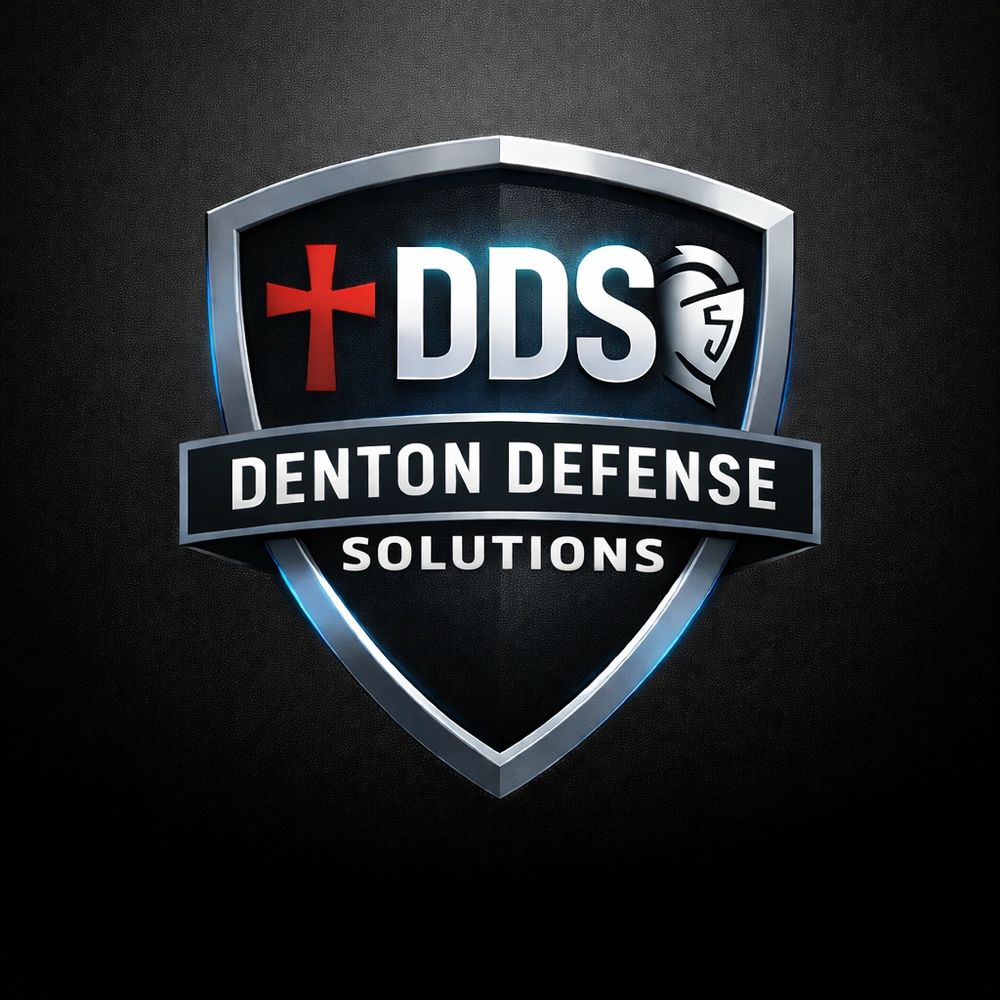 Shield logo with DDS, red cross, and knight helmet for Denton Defense Solutions.
