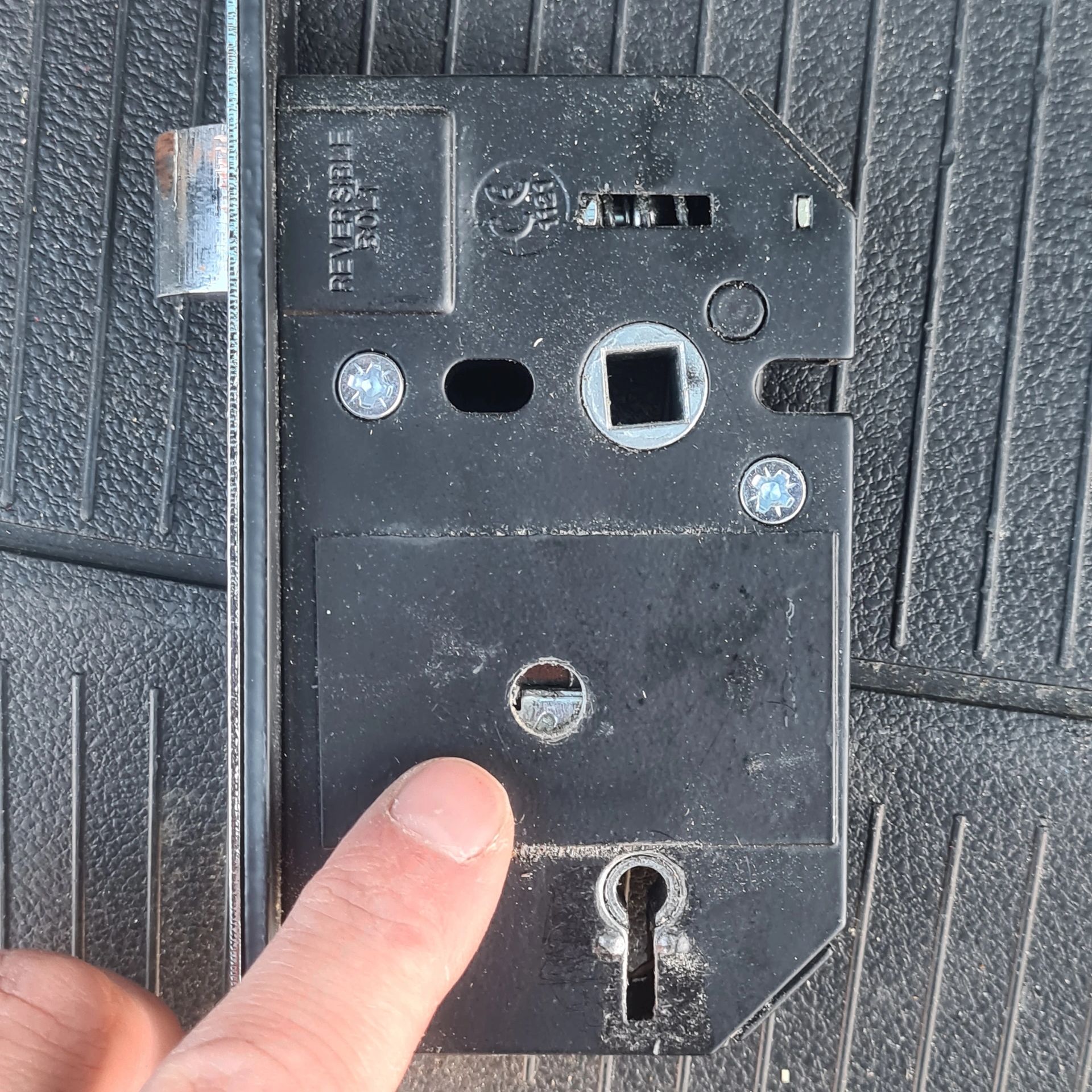 lock jammed on wooden door changed with a new lock