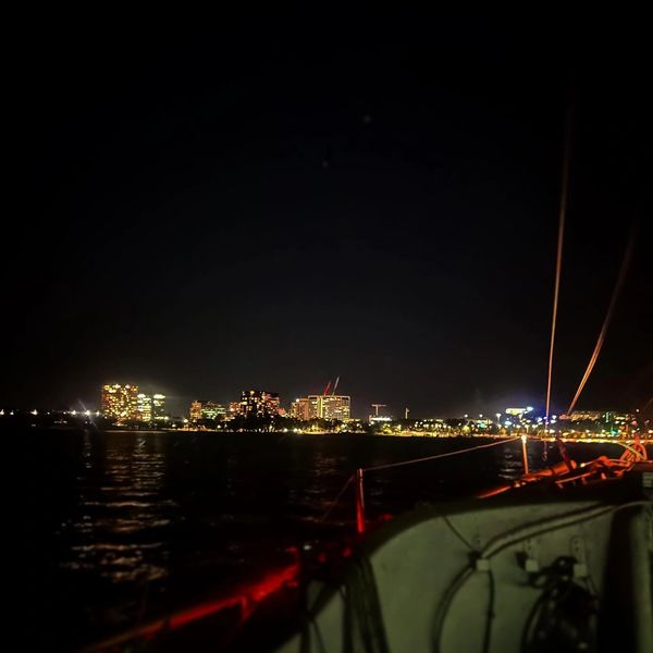Gorgeous city lights of Canberra, seen from the cockpit of a sailing boat