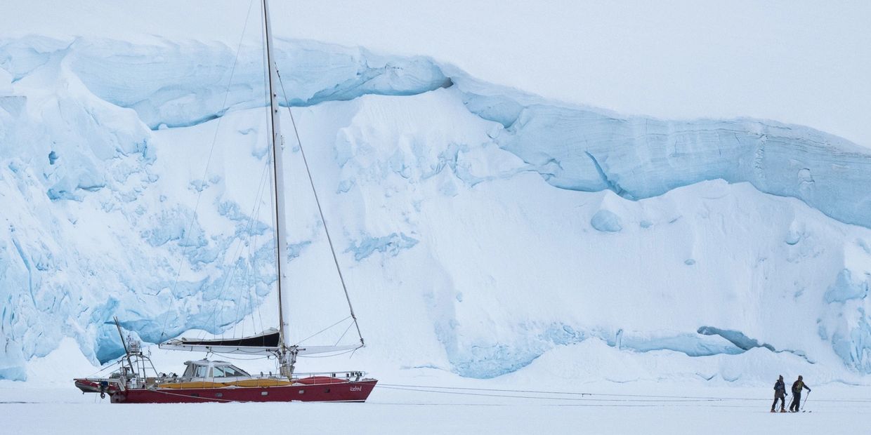 Icebird Antarctic expedition yacht in sea ice at Port Lockroy in Antarctica