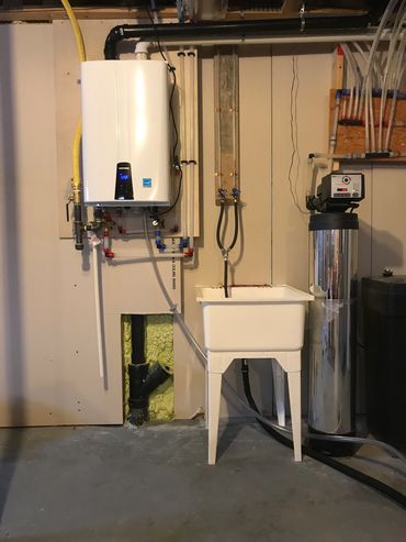 Signature Plumbing & Heating installed a Navien tankless water heater for reliable hot water.