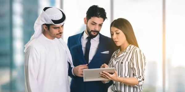 Diverse business team in Dubai UAE discussing strategy HR consulting collaboration across the GCC