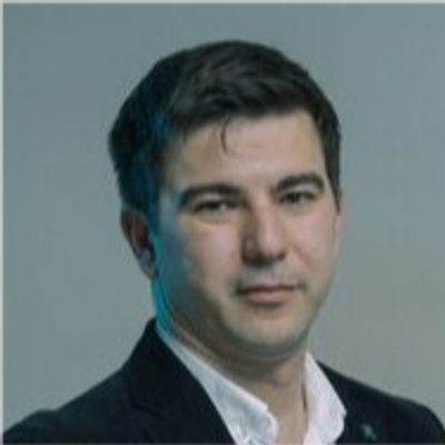 Portrait of a man in formal attire.