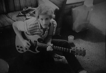 1980 with a porn mustache playing my Gibson SG Firebrand!