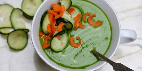 Pureed green soup: avocado, greens, lemon, salt...topped with cucumber and shredded carrots