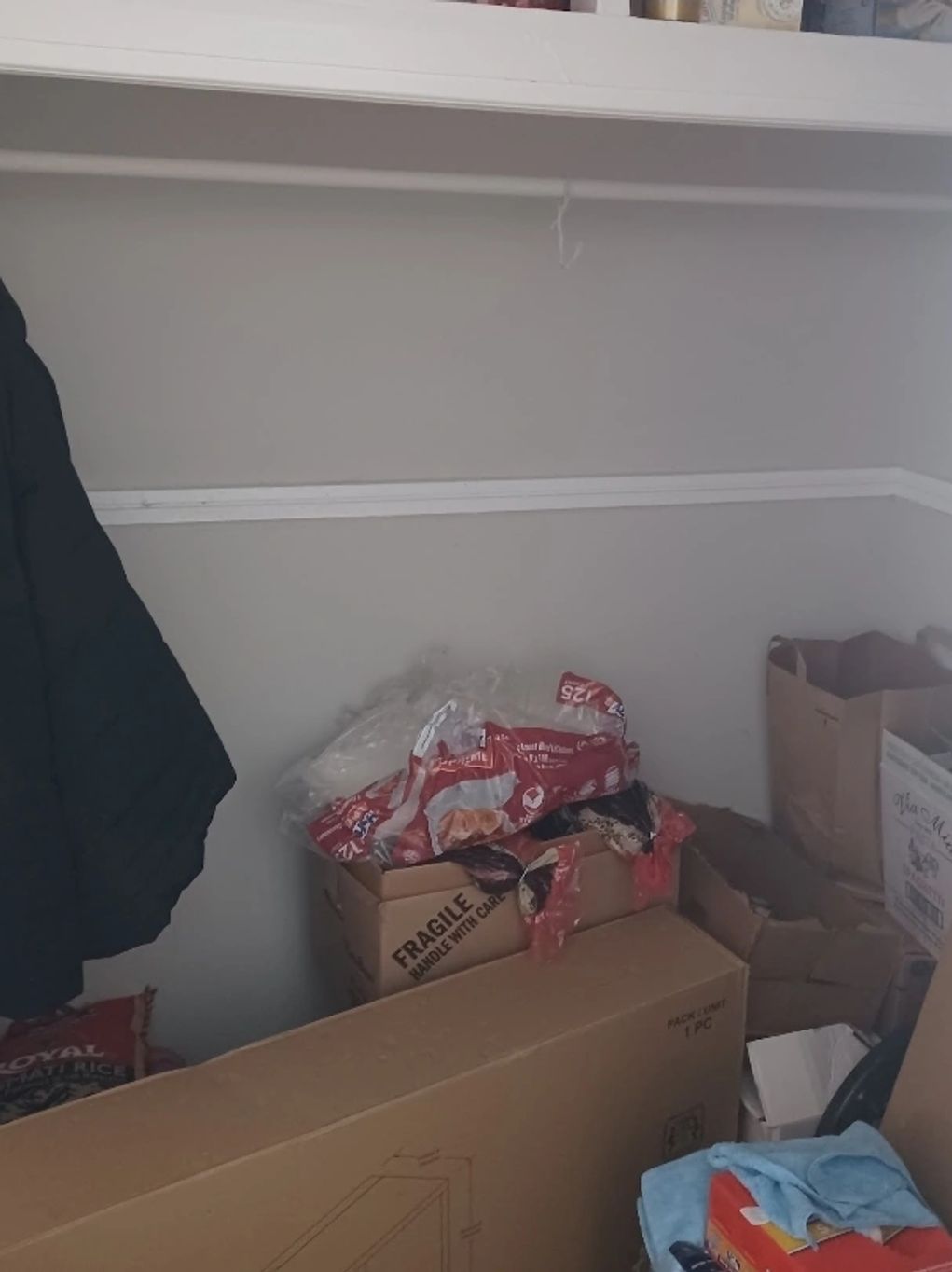 disorganized pantry space before professional organization