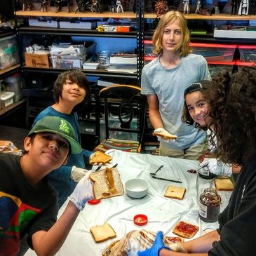 students making sandwiches