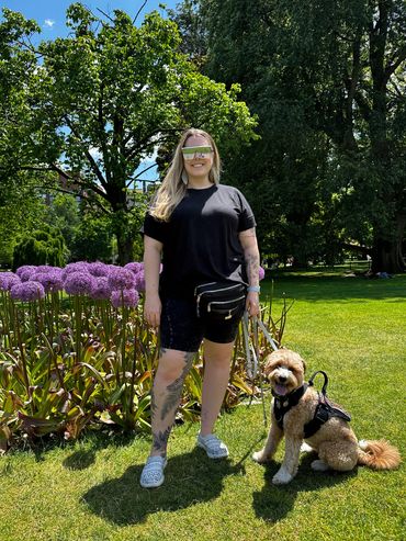 Our Founder, Logan Gore and her service dog, Stanley.