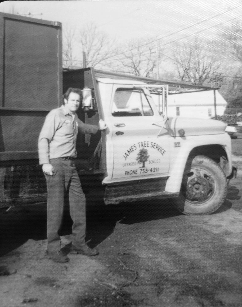Herbert James in 1967 with his first chipper truck.  