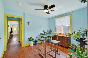 Dining area in converted Uptown shotgun home