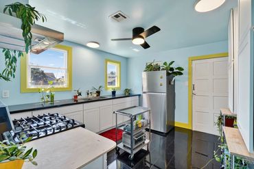 Modern kitchen in Uptown single family house