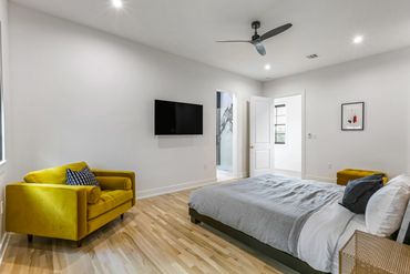 Primary bedroom in Frenchmen Street New Marigny home - Marcotte & Co. Real Estate