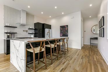 Open-concept living room in Frenchmen Street New Marigny home - Marcotte & Co.
