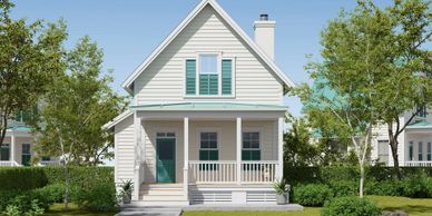 Cozy white house with teal shutters and porch surrounded by greenery.