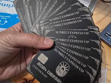 metal credit card style membership cards laser etched and fanned out for display