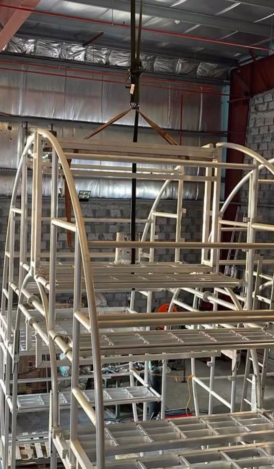 Metal frame structures in an industrial workshop.
