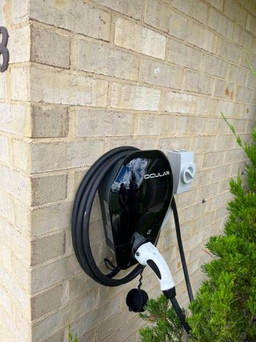 EV charger installation on exterior wall for electric vehicle charging in Newcastle NSW