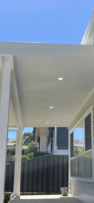 Outdoor downlight installation under patio for clean, modern exterior lighting in Newcastle