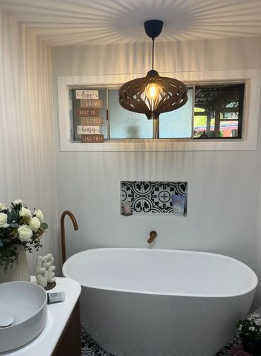 Bathroom feature lighting and pendant light installation above freestanding bath in Newcastle