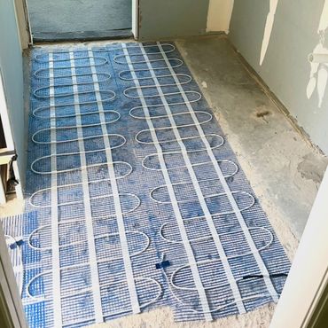 Electric underfloor heating installation for bathroom renovation in Newcastle