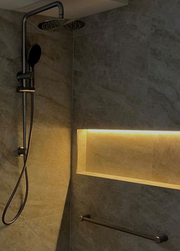 LED strip lighting installed in shower niche for modern bathroom in Newcastle