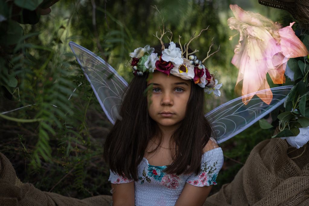A cute fairy with a fairy I added in hovering over her