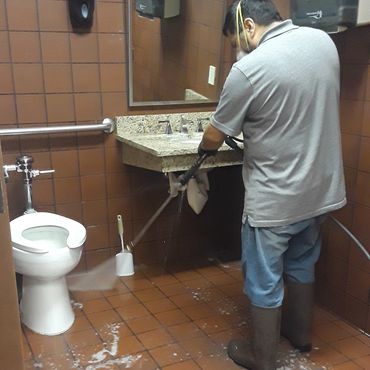 Deep cleaning bathrooms.