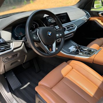 BMW steering wheel and tan leather seats