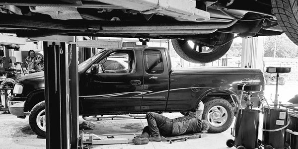 Qualified technician doing auto repair
