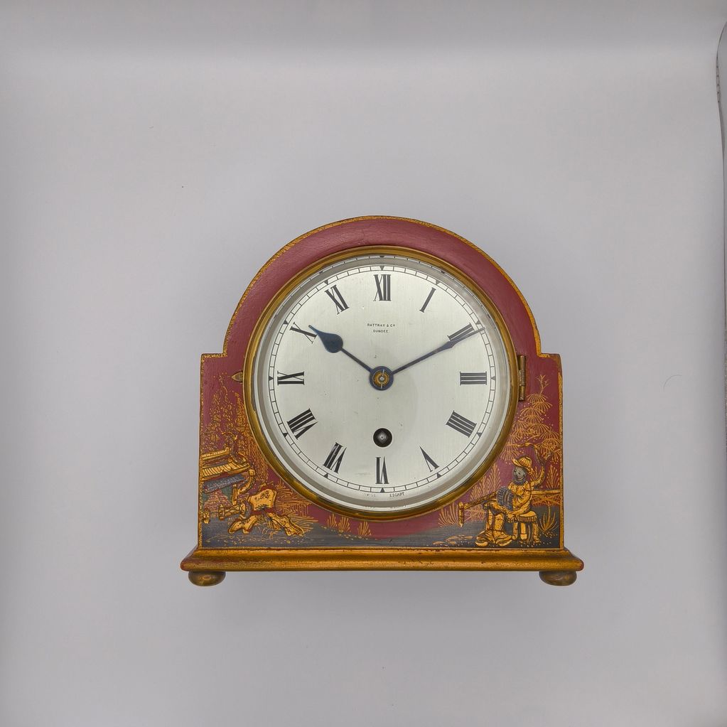 Red chinoiserie mantle clock
