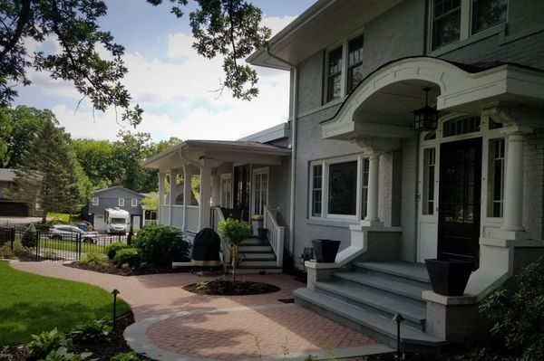 Traditional style, front entry, bluestone stoop, clay paver walkway
