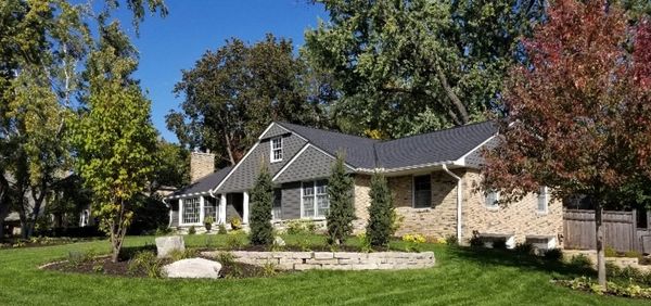 Front yard planting, limestone wall
