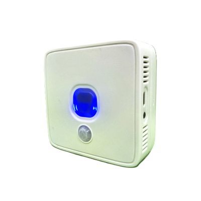 White electronic sensor device with blue light indicator.