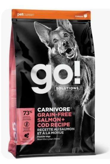 Bag of grain-free salmon and cod dog food with a German Shepherd image.